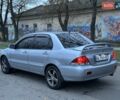 Серый Мицубиси Лансер, объемом двигателя 1.6 л и пробегом 210 тыс. км за 4600 $, фото 4 на Automoto.ua