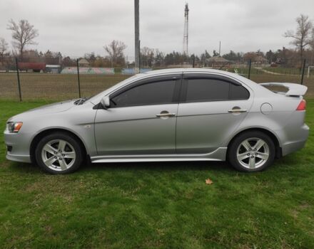 Серый Мицубиси Лансер, объемом двигателя 2 л и пробегом 124 тыс. км за 7499 $, фото 6 на Automoto.ua