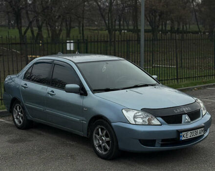 Серый Мицубиси Лансер, объемом двигателя 1.6 л и пробегом 238 тыс. км за 4400 $, фото 4 на Automoto.ua