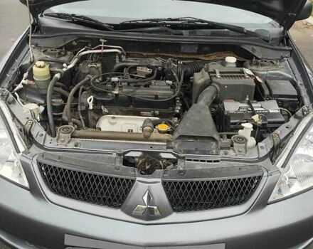 Серый Мицубиси Лансер, объемом двигателя 1.6 л и пробегом 181 тыс. км за 4500 $, фото 6 на Automoto.ua