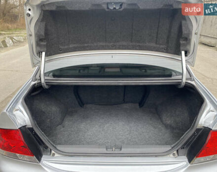 Серый Мицубиси Лансер, объемом двигателя 1.58 л и пробегом 240 тыс. км за 5500 $, фото 5 на Automoto.ua