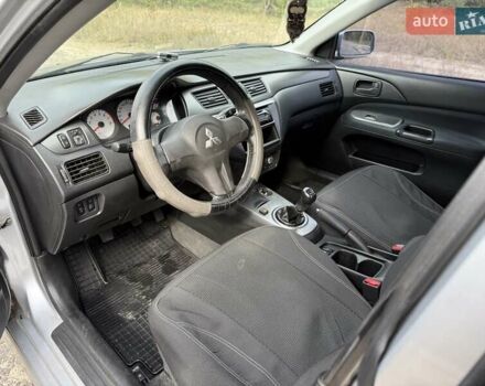 Серый Мицубиси Лансер, объемом двигателя 1.6 л и пробегом 200 тыс. км за 4400 $, фото 16 на Automoto.ua