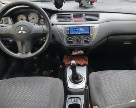 Серый Мицубиси Лансер, объемом двигателя 1.6 л и пробегом 263 тыс. км за 2350 $, фото 8 на Automoto.ua