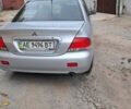 Сірий Міцубісі Lancer, об'ємом двигуна 1.6 л та пробігом 122 тис. км за 5500 $, фото 2 на Automoto.ua