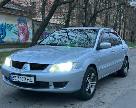 Сірий Міцубісі Lancer, об'ємом двигуна 1.6 л та пробігом 210 тис. км за 4750 $, фото 1 на Automoto.ua