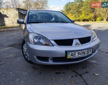 Сірий Міцубісі Lancer, об'ємом двигуна 1.58 л та пробігом 122 тис. км за 6300 $, фото 20 на Automoto.ua