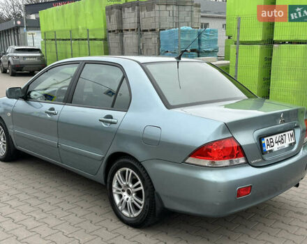 Сірий Міцубісі Lancer, об'ємом двигуна 1.6 л та пробігом 116 тис. км за 5199 $, фото 7 на Automoto.ua