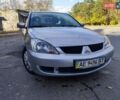 Сірий Міцубісі Lancer, об'ємом двигуна 1.58 л та пробігом 122 тис. км за 6300 $, фото 20 на Automoto.ua