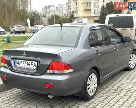 Сірий Міцубісі Lancer, об'ємом двигуна 1.6 л та пробігом 177 тис. км за 2800 $, фото 7 на Automoto.ua