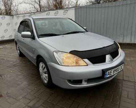 Серый Мицубиси Лансер, объемом двигателя 1.6 л и пробегом 205 тыс. км за 5300 $, фото 16 на Automoto.ua