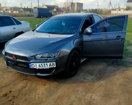 Серый Мицубиси Лансер, объемом двигателя 2 л и пробегом 351 тыс. км за 7000 $, фото 2 на Automoto.ua