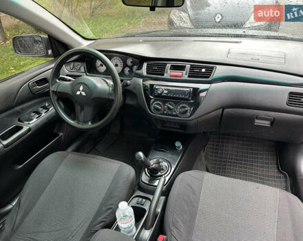 Серый Мицубиси Лансер, объемом двигателя 1.6 л и пробегом 115 тыс. км за 2800 $, фото 10 на Automoto.ua