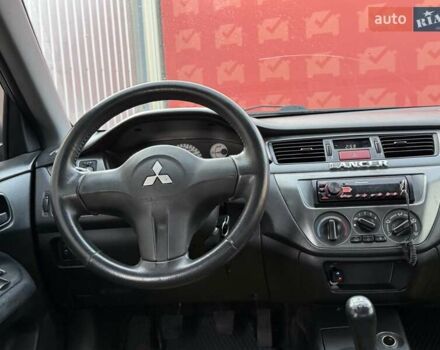 Сірий Міцубісі Lancer, об'ємом двигуна 1.6 л та пробігом 395 тис. км за 4900 $, фото 15 на Automoto.ua