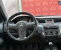 Сірий Міцубісі Lancer, об'ємом двигуна 1.6 л та пробігом 395 тис. км за 4900 $, фото 15 на Automoto.ua
