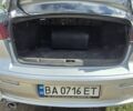 Сірий Міцубісі Lancer, об'ємом двигуна 2 л та пробігом 239 тис. км за 4318 $, фото 4 на Automoto.ua