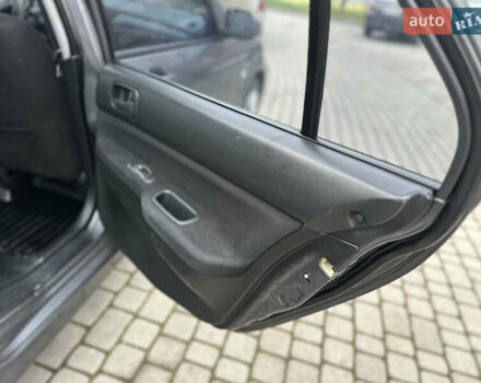 Сірий Міцубісі Lancer, об'ємом двигуна 1.6 л та пробігом 177 тис. км за 2800 $, фото 29 на Automoto.ua