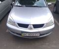 Сірий Міцубісі Lancer, об'ємом двигуна 1.6 л та пробігом 238 тис. км за 3800 $, фото 1 на Automoto.ua