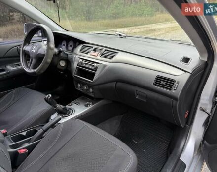 Серый Мицубиси Лансер, объемом двигателя 1.6 л и пробегом 200 тыс. км за 4400 $, фото 19 на Automoto.ua