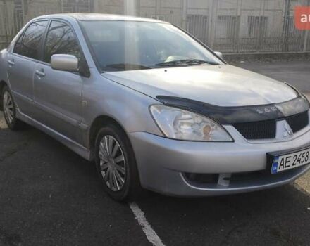 Серый Мицубиси Лансер, объемом двигателя 1.6 л и пробегом 205 тыс. км за 4500 $, фото 1 на Automoto.ua