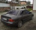 Сірий Міцубісі Lancer, об'ємом двигуна 1.6 л та пробігом 337 тис. км за 4600 $, фото 11 на Automoto.ua