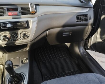 Сірий Міцубісі Lancer, об'ємом двигуна 1.6 л та пробігом 178 тис. км за 5464 $, фото 10 на Automoto.ua