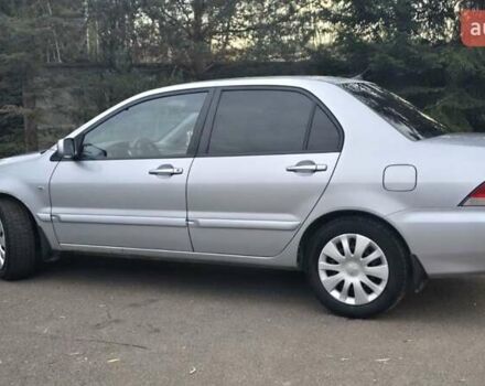 Сірий Міцубісі Lancer, об'ємом двигуна 1.6 л та пробігом 213 тис. км за 3600 $, фото 13 на Automoto.ua