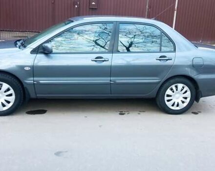 Міцубісі Lancer 2007 у Хмельницькому на Automoto.ua Сірий Міцубісі Lancer, об'ємом двигуна 1.58 л та пробігом 143 тис. км за 4100 $, фото 4 на Automoto.ua