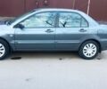 Міцубісі Lancer 2007 у Хмельницькому на Automoto.ua Сірий Міцубісі Lancer, об'ємом двигуна 1.58 л та пробігом 143 тис. км за 4100 $, фото 4 на Automoto.ua