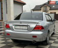 Сірий Міцубісі Lancer, об'ємом двигуна 1.6 л та пробігом 281 тис. км за 3999 $, фото 10 на Automoto.ua