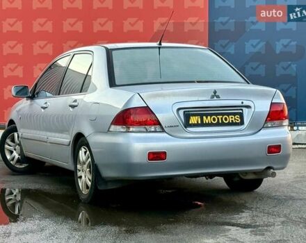 Сірий Міцубісі Lancer, об'ємом двигуна 1.6 л та пробігом 395 тис. км за 4900 $, фото 3 на Automoto.ua
