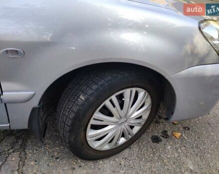 Сірий Міцубісі Lancer, об'ємом двигуна 1.58 л та пробігом 122 тис. км за 6300 $, фото 17 на Automoto.ua