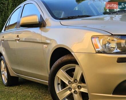 Серый Мицубиси Лансер, объемом двигателя 2 л и пробегом 282 тыс. км за 5450 $, фото 23 на Automoto.ua