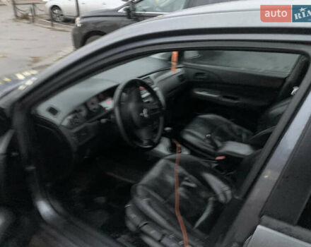 Серый Мицубиси Лансер, объемом двигателя 1.6 л и пробегом 260 тыс. км за 3950 $, фото 5 на Automoto.ua