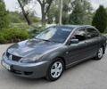 Сірий Міцубісі Lancer, об'ємом двигуна 1.6 л та пробігом 185 тис. км за 4004 $, фото 1 на Automoto.ua