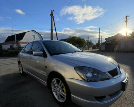 Мицубиси Лансер 2007 в Василькове на Automoto.ua Серый Мицубиси Лансер, объемом двигателя 2 л и пробегом 177 тыс. км за 5399 $, фото 7 на Automoto.ua