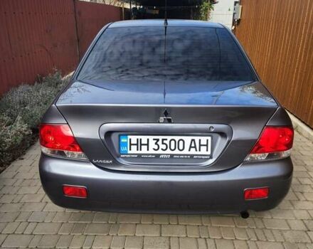 Сірий Міцубісі Lancer, об'ємом двигуна 1.6 л та пробігом 174 тис. км за 5850 $, фото 4 на Automoto.ua