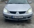 Сірий Міцубісі Lancer, об'ємом двигуна 1.6 л та пробігом 200 тис. км за 4200 $, фото 1 на Automoto.ua