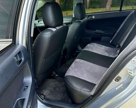 Серый Мицубиси Лансер, объемом двигателя 2 л и пробегом 250 тыс. км за 6000 $, фото 3 на Automoto.ua