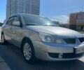 Сірий Міцубісі Lancer, об'ємом двигуна 1.58 л та пробігом 120 тис. км за 5100 $, фото 1 на Automoto.ua