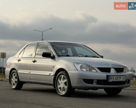 Серый Мицубиси Лансер, объемом двигателя 1.3 л и пробегом 160 тыс. км за 5555 $, фото 14 на Automoto.ua