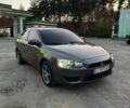 Сірий Міцубісі Lancer, об'ємом двигуна 1.5 л та пробігом 190 тис. км за 4499 $, фото 1 на Automoto.ua