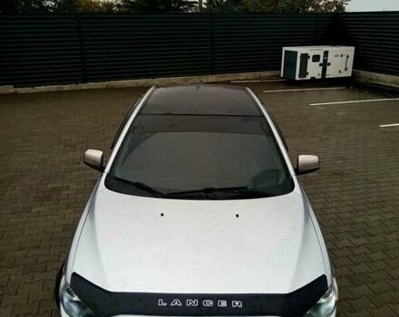 Сірий Міцубісі Lancer, об'ємом двигуна 2 л та пробігом 268 тис. км за 5555 $, фото 13 на Automoto.ua