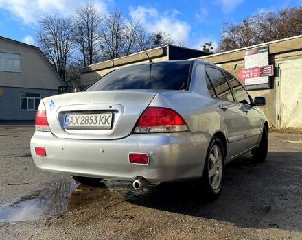 Сірий Міцубісі Lancer, об'ємом двигуна 1.6 л та пробігом 207 тис. км за 5000 $, фото 1 на Automoto.ua