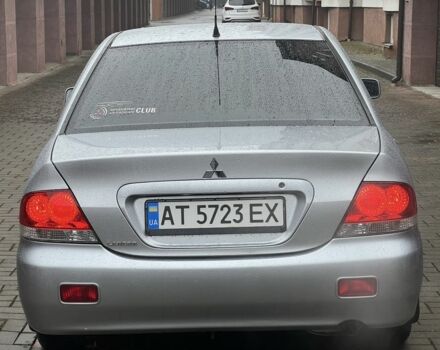 Серый Мицубиси Лансер, объемом двигателя 1.6 л и пробегом 272 тыс. км за 4500 $, фото 4 на Automoto.ua