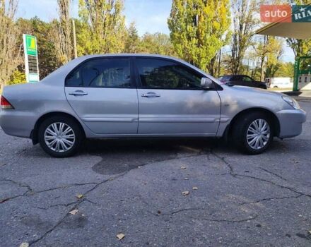 Сірий Міцубісі Lancer, об'ємом двигуна 1.58 л та пробігом 122 тис. км за 6300 $, фото 7 на Automoto.ua