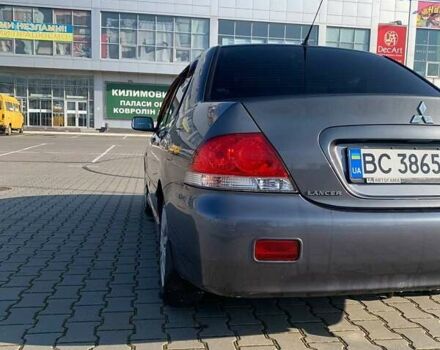 Серый Мицубиси Лансер, объемом двигателя 1.6 л и пробегом 260 тыс. км за 3950 $, фото 11 на Automoto.ua