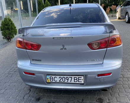 Серый Мицубиси Лансер, объемом двигателя 2 л и пробегом 215 тыс. км за 5750 $, фото 2 на Automoto.ua