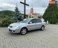 Сірий Міцубісі Lancer, об'ємом двигуна 1.59 л та пробігом 209 тис. км за 4200 $, фото 1 на Automoto.ua