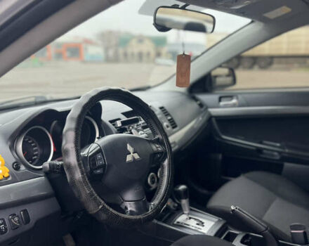 Серый Мицубиси Лансер, объемом двигателя 2 л и пробегом 286 тыс. км за 5800 $, фото 9 на Automoto.ua