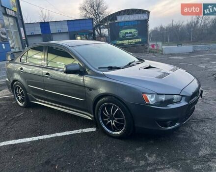 Серый Мицубиси Лансер, объемом двигателя 2 л и пробегом 170 тыс. км за 6999 $, фото 4 на Automoto.ua